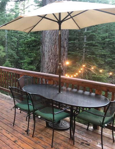 Table on back deck overlooking the woods